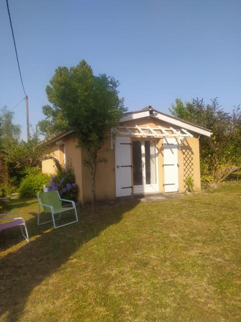 Maison dans un écrin de verdure