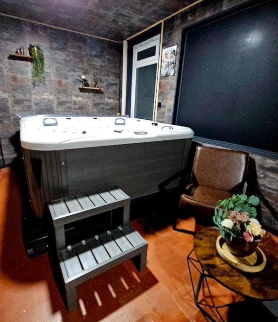 Location romantique avec jacuzzi et salle cinéma