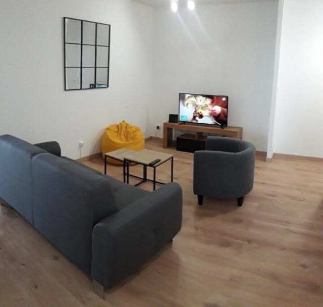 Appartement F4 avec parking gratuit sur place