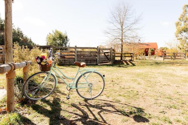 THE STABLES, a self contained farmstay featuring outdoor baths, fireplace & wineries