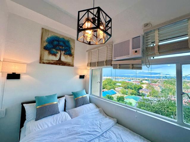 Studio One Condominium, Alabang - Bluu - Fiber Wi-Fi, Netflix-ready