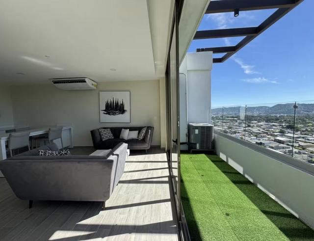 Penthouse with Volcano Views & Top Amenities - AC, Gym, Lounge, Patio, Workspace