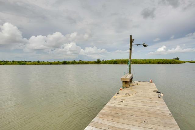 Golden Meadow Getaway Waterfront Retreat with Deck