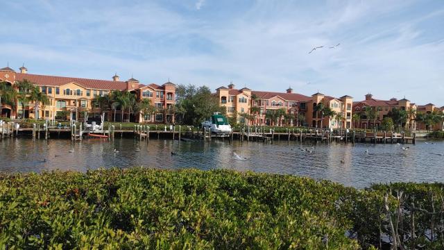 Vacation or Relocation at Posh Gr Venezia 2BR Waterfront Available May 25