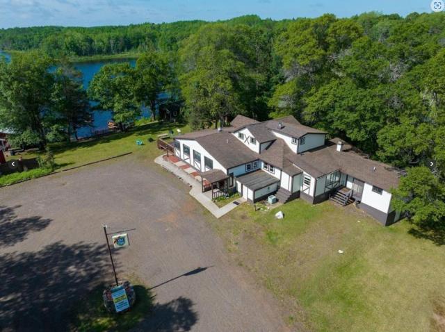 NORTHWOODS HAVEN HOUSE - 6 BED-4 BATH LODGE ON LAKE IN SPOONER! ENJOY THE LAKE LIFE, TRAILS and AMMENITIES, INCLUDING COMMERCIAL KITCHEN