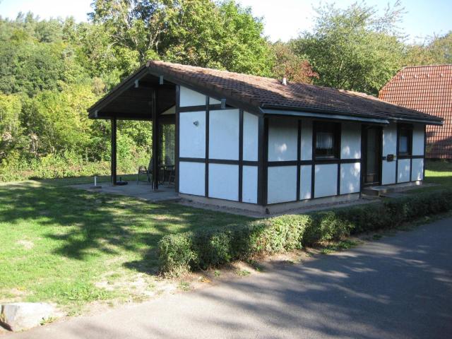 Single storey detached bungalow, in a wooded area