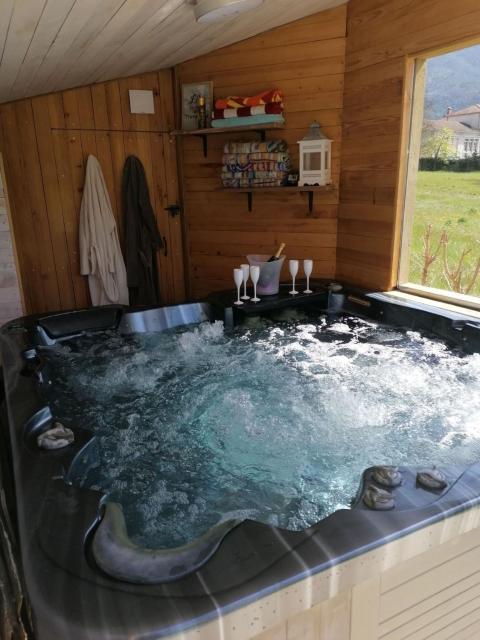 Chambre avec jacuzzi privatif "le pêcher"