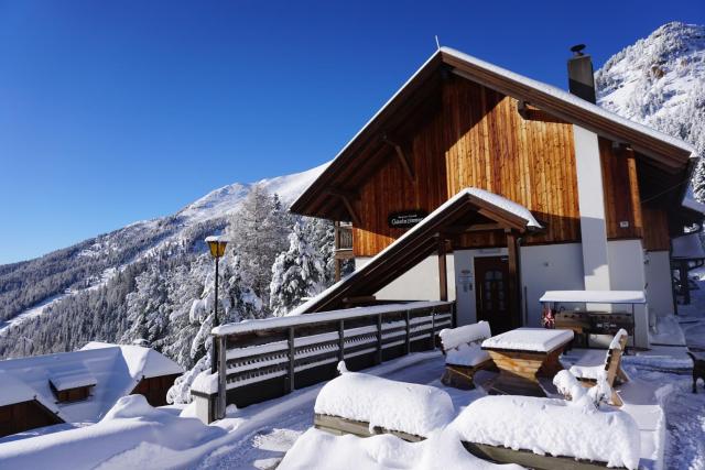 Bergheim Schmidt, Almhütten im Wald Appartments an der Piste Alpine Huts in Forrest Appartments near Slope