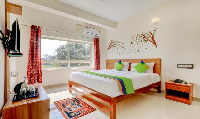 Treebo Atithi Comforts, 1 Km From Nisargadhama Forest