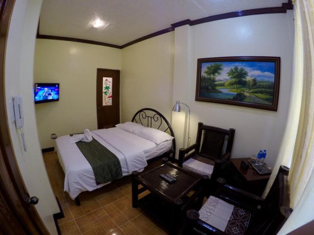 The Executive Villa Inn & Suites